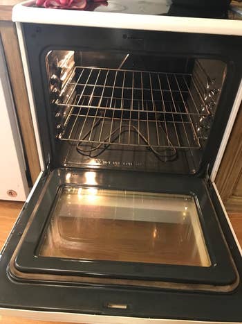 Reviewer photo of same oven after using Oven Off cleaner