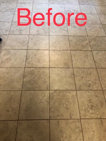 Reviewer's tiled floor before using grout cleaner