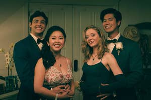 Peter, Lara Jean, Chris and Lucas posing for a photo in their prom outfits