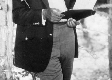 man with longish hair and mustache