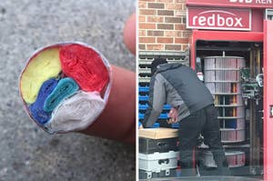 A RedBox machine is open showing its inner machinery