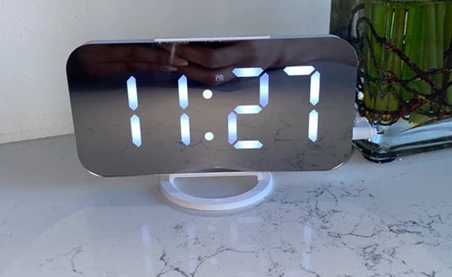 a reviewer photo of the alarm clock 