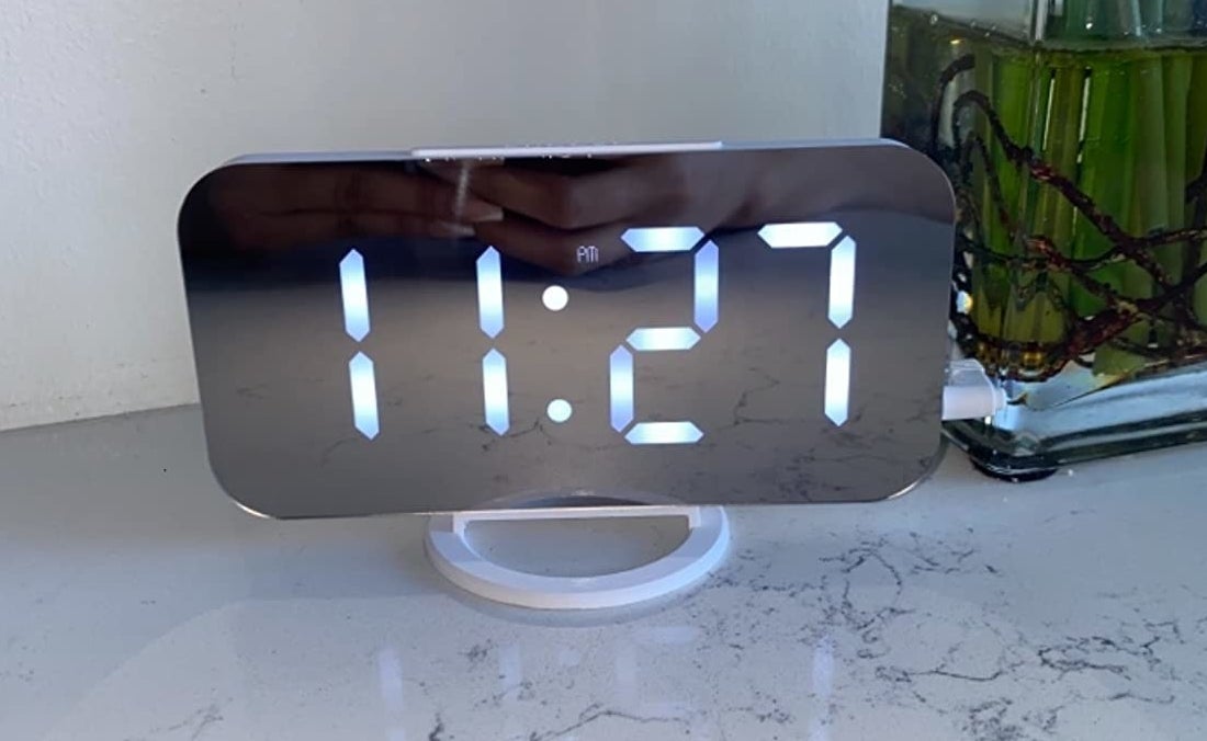 a reviewer photo of the alarm clock 