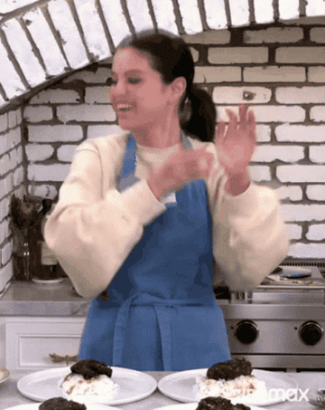 Selena Gomez dancing in kitchen in &quot;Selena + Chef&quot;