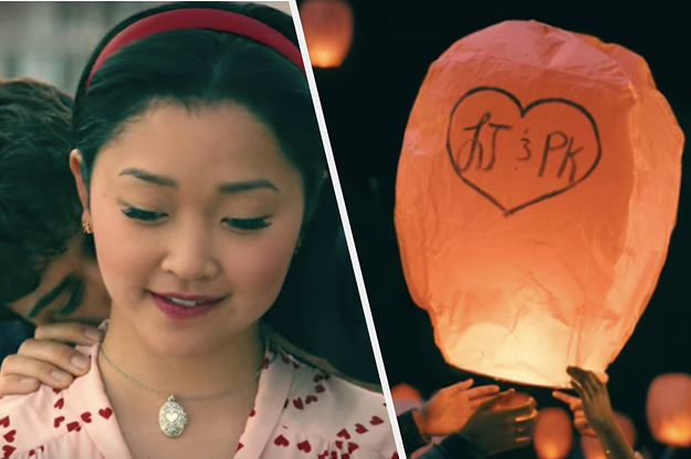 Peter is kissing Lara Jean on the neck with a lantern labeled,