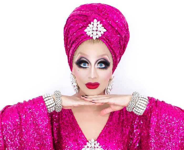 Photo of Bianca wearing a magenta sparkly caftan with matching turban   