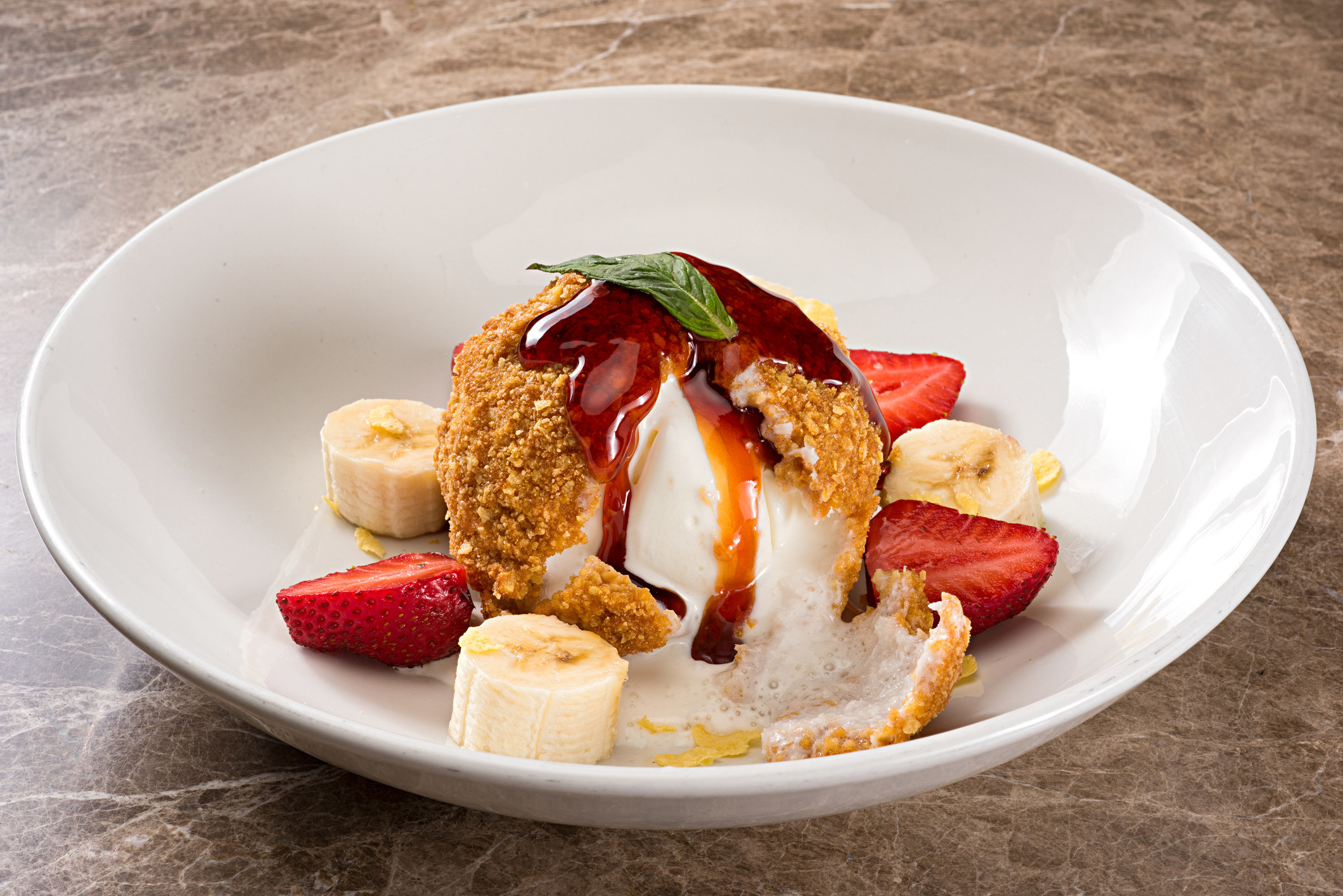 Fried ice cream with banana and strawberries