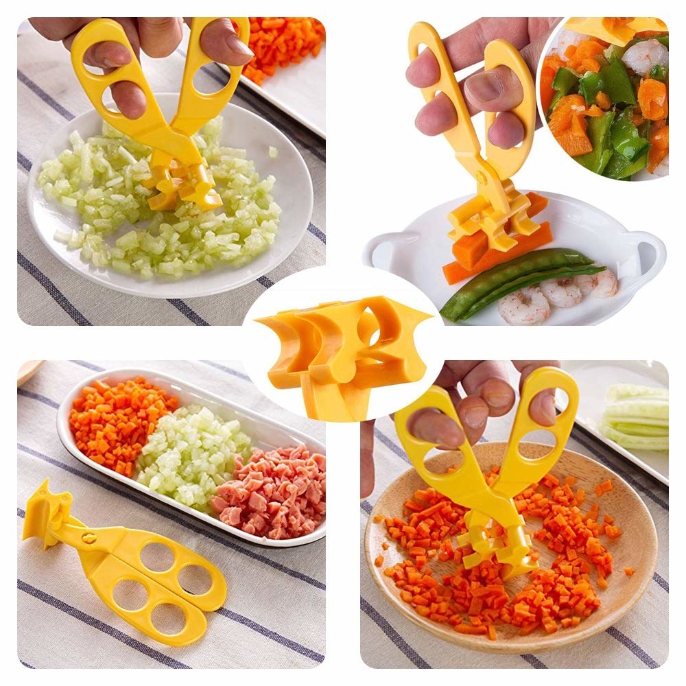 Plastic scissors cutting up food into teeny tiny pieces 
