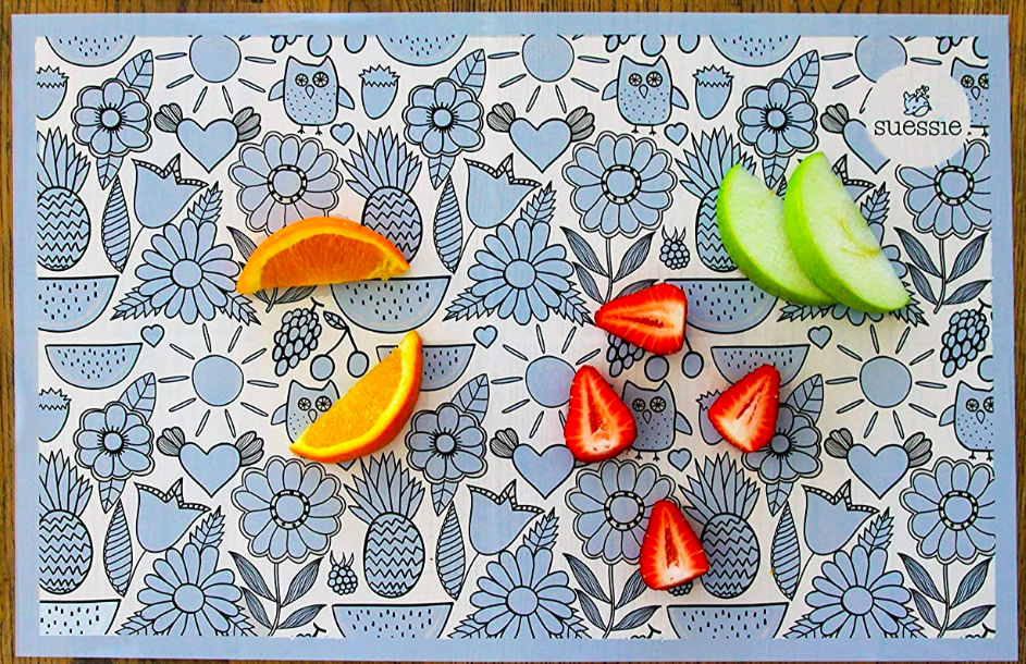 Patterned rectangular placemat with sliced fruit on top