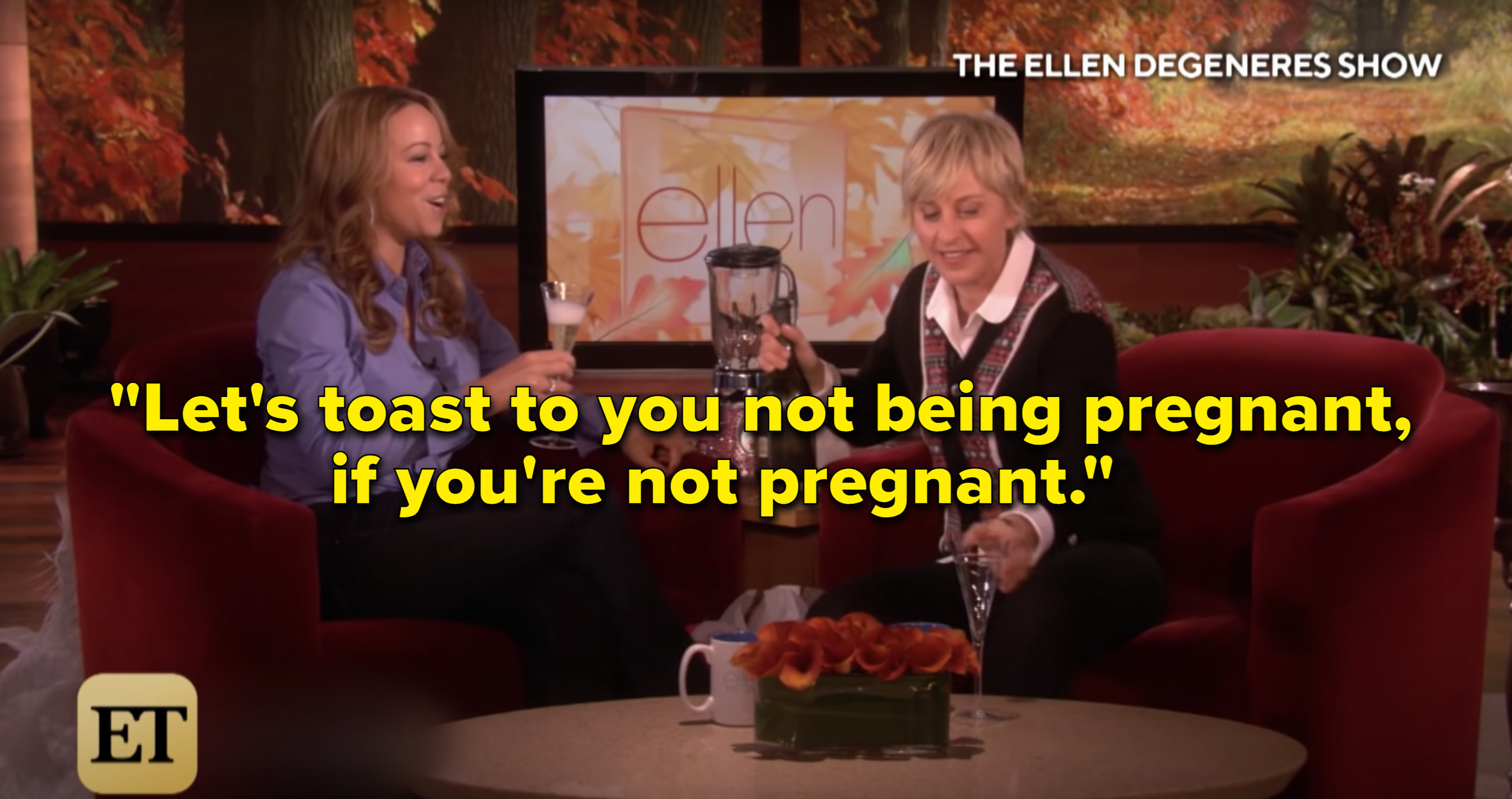 Ellen pressuring Mariah to drink champagne