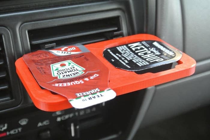 Clip sauce holder in use in car