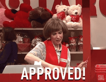 Target lady holding a credit card and saying &quot;approved&quot;