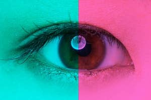 an eye with teal blue covering one side and pink covering the other