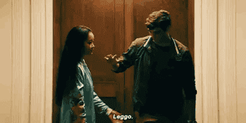 Peter Kavinsky grabbing Lara Jean&#x27;s hand and saying &quot;leggo&quot;