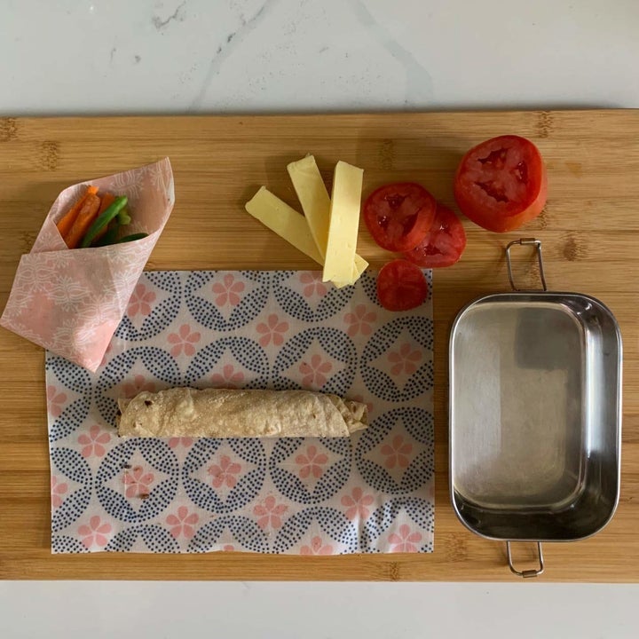 A beeswax wrapper with food in it