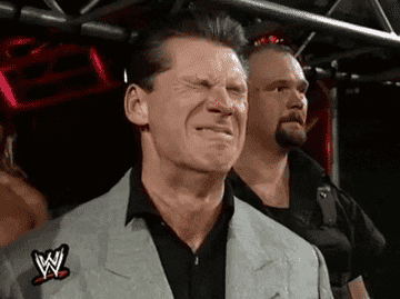 Vince McMahon grimacing.