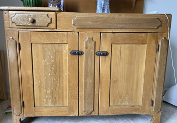 a reviewer's wooden furniture looking worn out