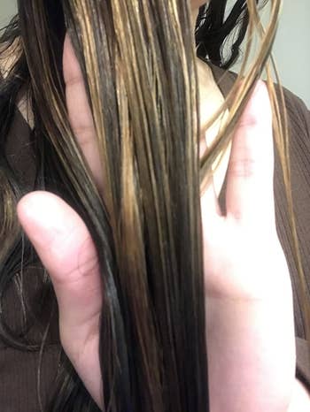 Reviewer photo of hair after using detangling spray