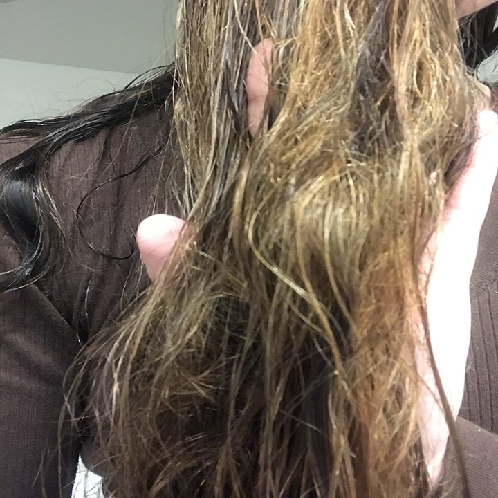 Reviewer photo of hair before using detangling spray