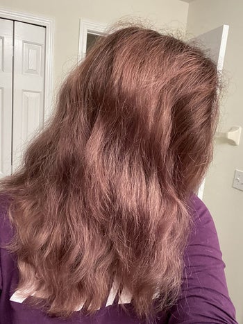 Reviewer showing hair before using argan oil mask