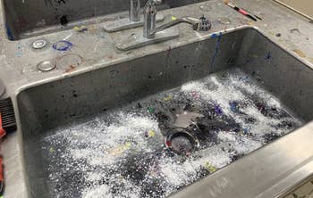 a sink dirty with years of paint build up