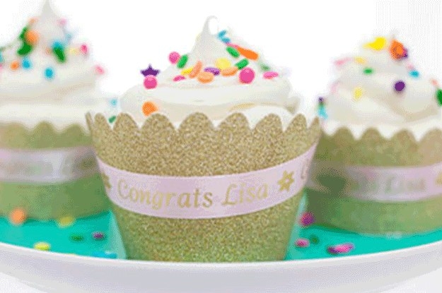 Cupcakes with personalized ribbon.