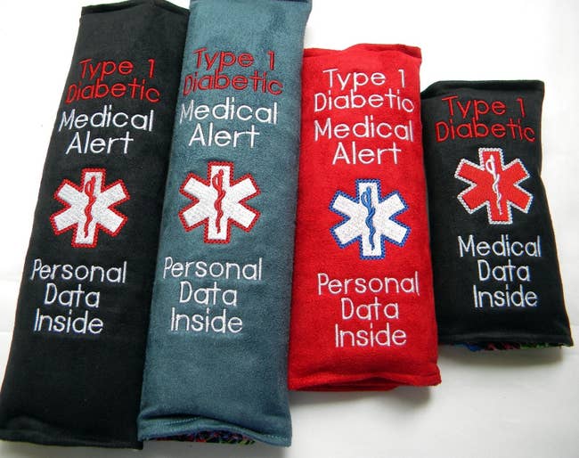 row of seat belt covers with Type 1 Diabetic medical alert on it