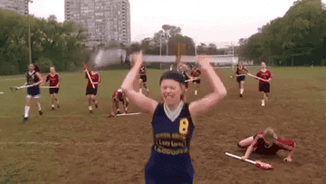 Regina George from &quot;Meal Girls&quot; jumping after scoring a lacrosse goal