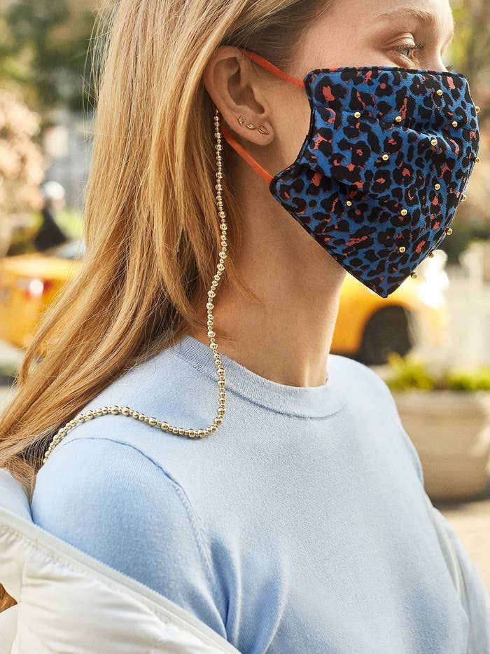 Model wearing Baublebar face mask chain