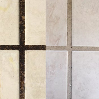 reviewer's up close picture of dirty grout next to clean grout