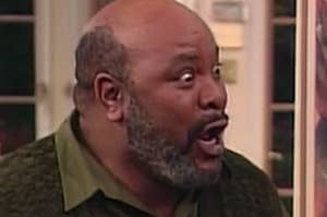 Uncle Phil from The Fresh Prince of Bel-Air laughing hysterically