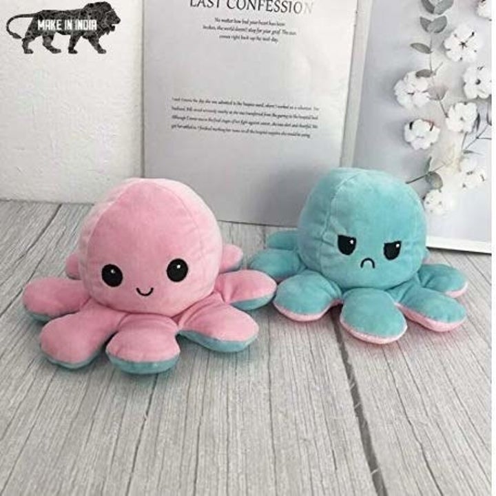 A pink and reversed blue octopus plushy 