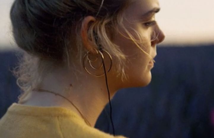 Girl listening to headphones