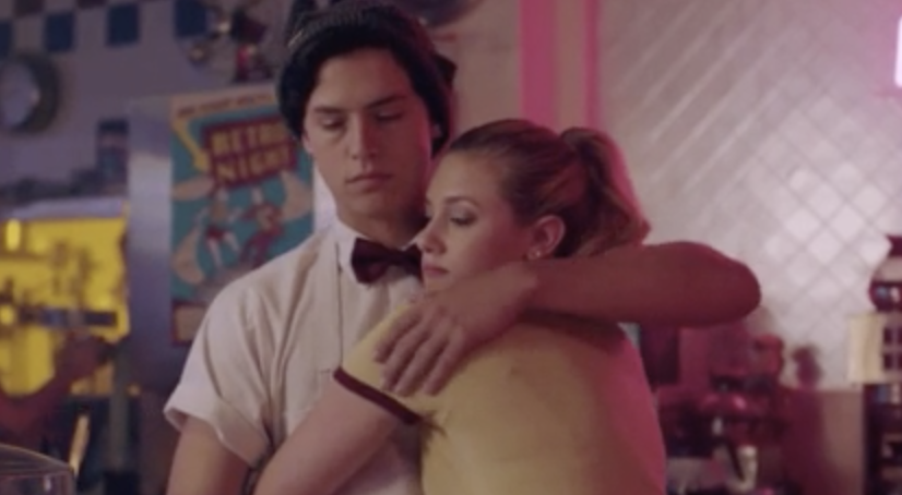 Jughead and Betty hugging.