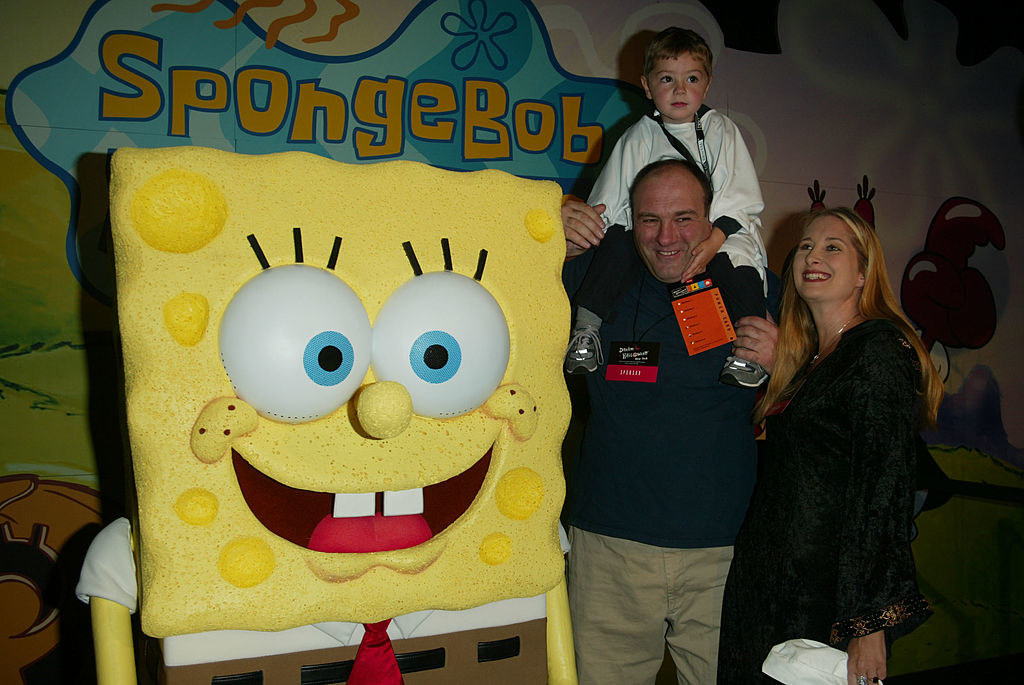 the happy family is posed with sponge bob