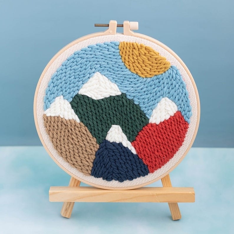 embroidery hoop of a mountain scene