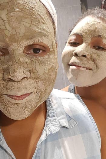 A reviewer selfie of two people wearing the face mask 
