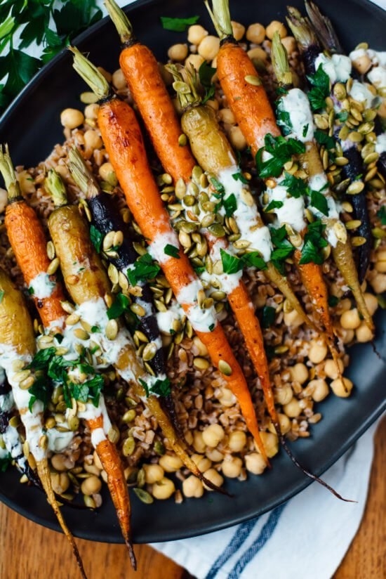 Roasted carrots with chickpeas, faro, and crème fraîche.