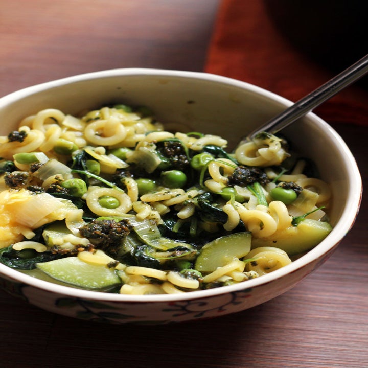 A bowl of minestrone verde with leeks, kale, and greens.