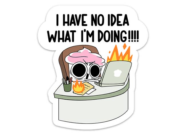 Sticker of Cuppy sitting at a desk with a laptop and notes on fire with text that says 