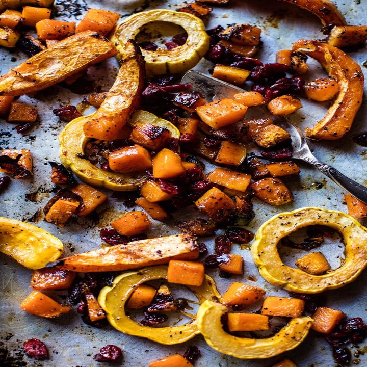 Squash roasting on a sheet pan.