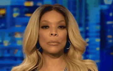 Wendy Williams gazing into the camera with her lips pursed