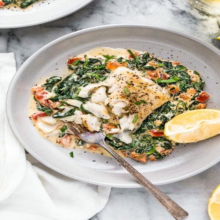 Fish in a creamy spinach Florentine sauce.