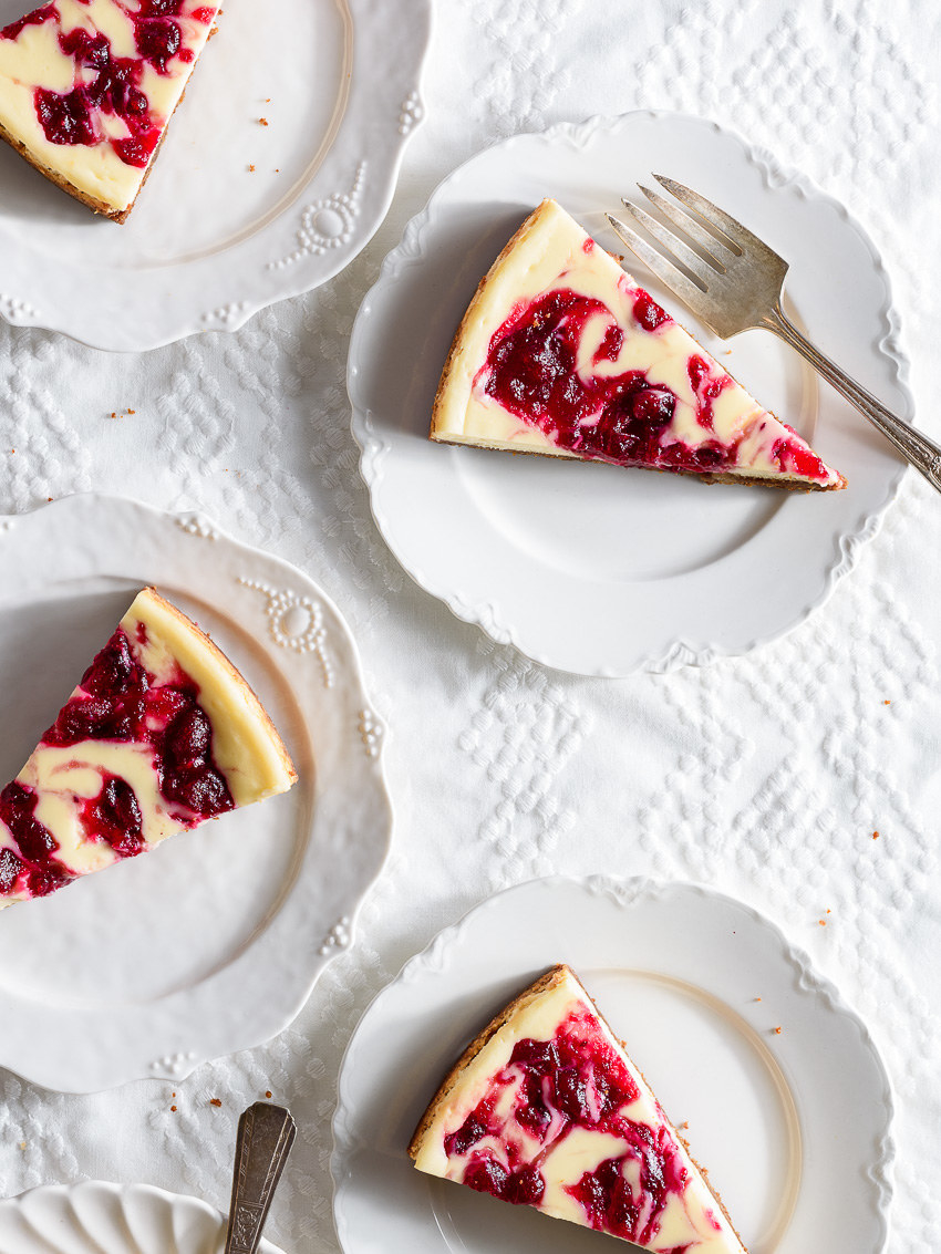 Slices of cranberry swirl cheesecake.