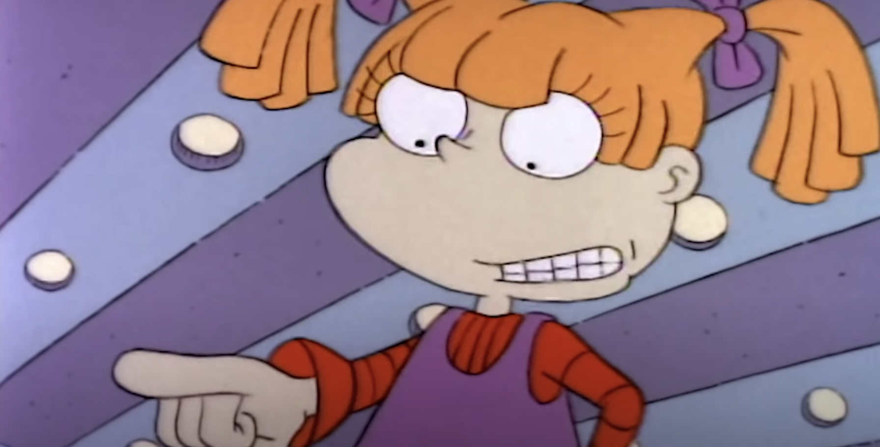 Angelica pointing her finger and looking mean
