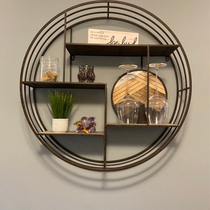 Review photo of the bronze/copper circle accent shelf