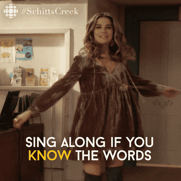 A GIF of Alexis Rose from Schitt&#x27;s Creek saying, &quot;Sing along if your know the words&quot;.