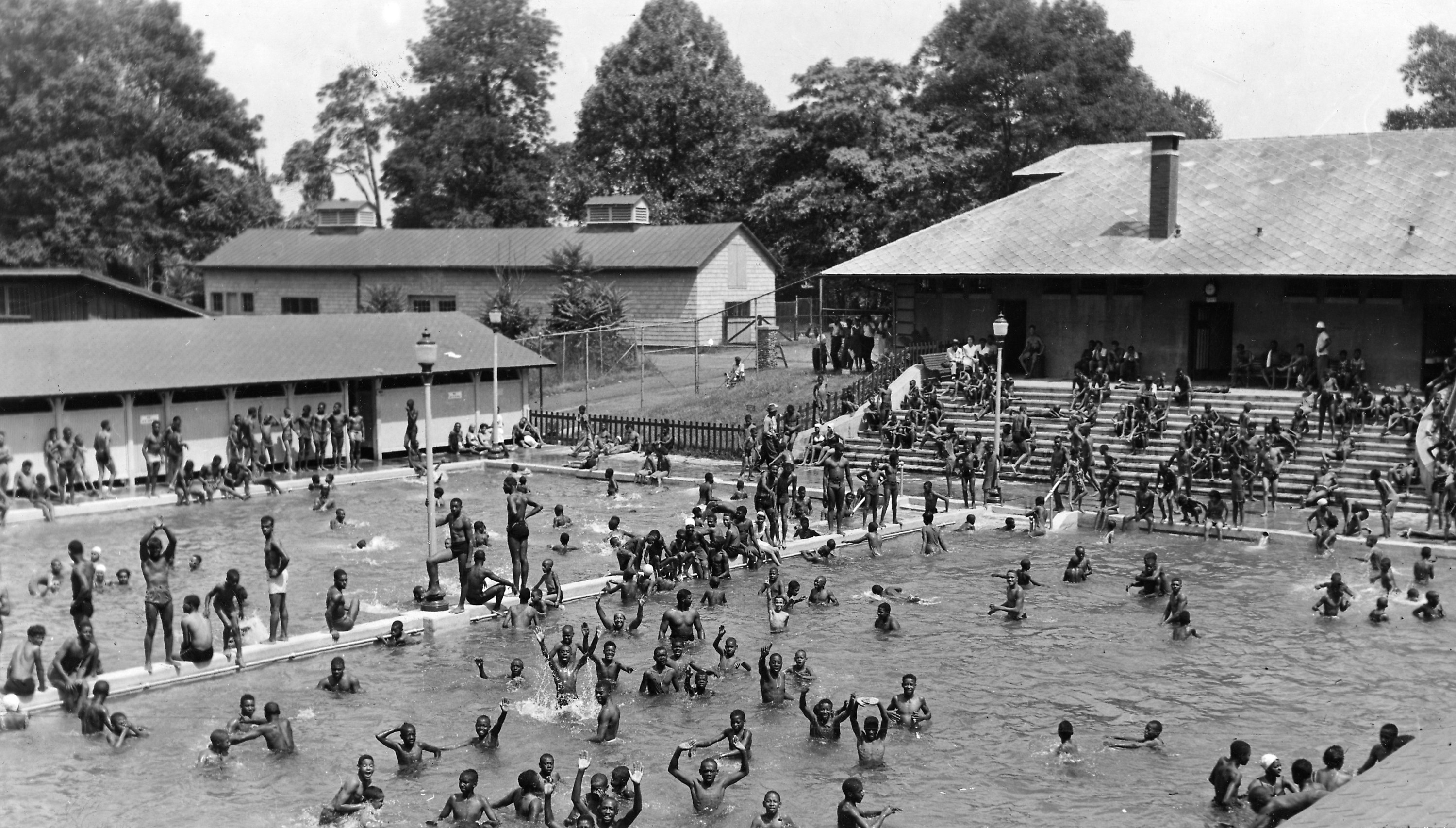 Black children swimming in a segregated pool at Druid Hill Park, Baltimore, Maryland, 1955