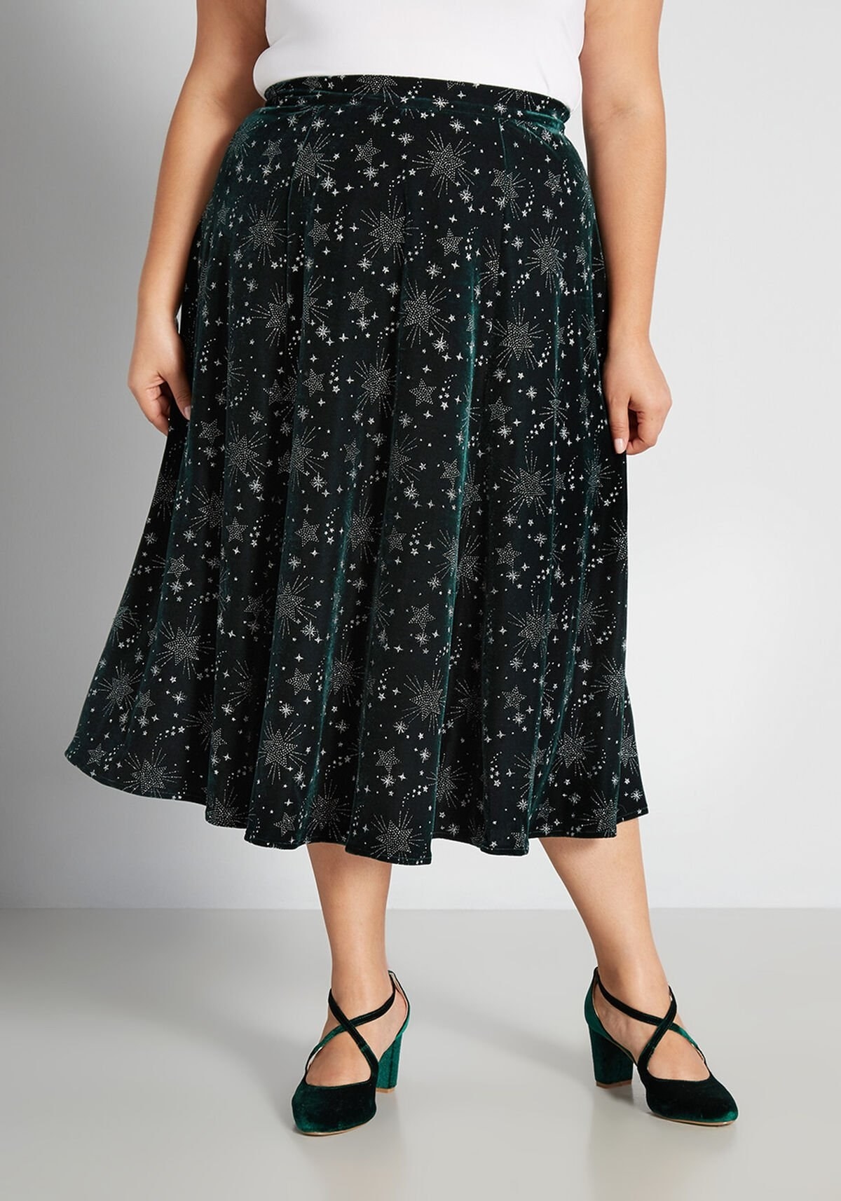 Model wearing star print skirt