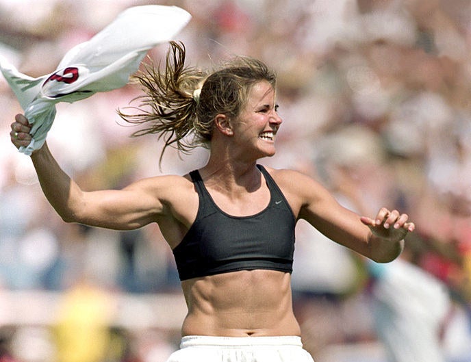 Brandi waving her jersey after scoring the winning goal at the World Cup